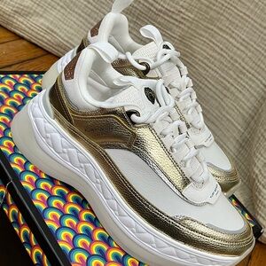 Kurt Geiger White and Gold Sneakers